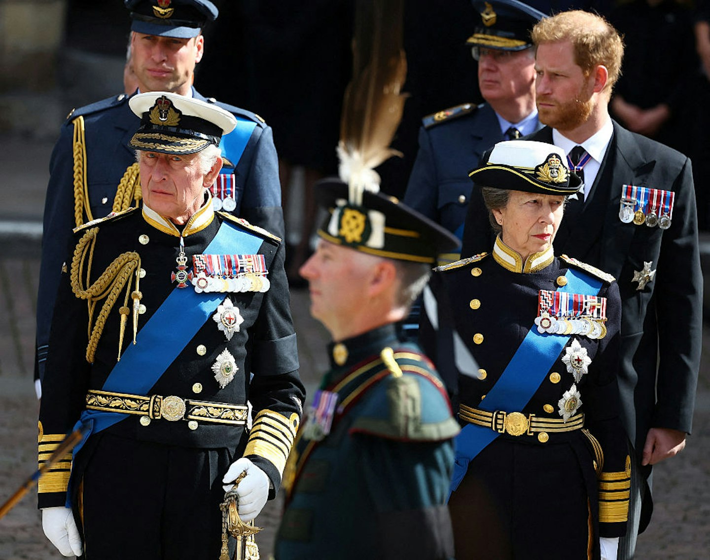 King Charles III, Princess Anne, Prince William, and Prince Harry, stand outside Westminster Abbey after the State Funeral Service in London