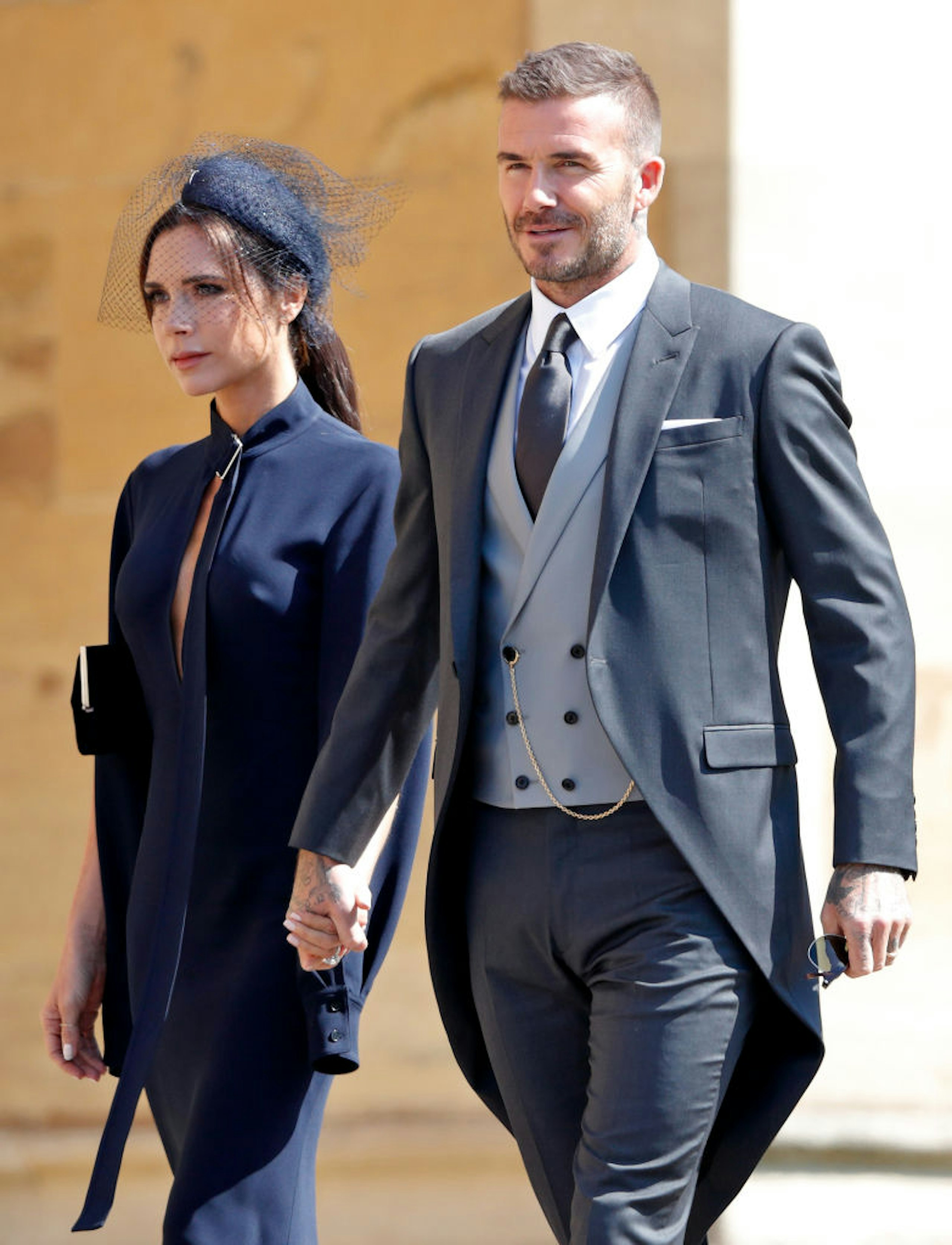 Victoria Beckham and David Beckham attend the wedding of Prince Harry to Ms Meghan Markle at St George's Chapel, Windsor Castle