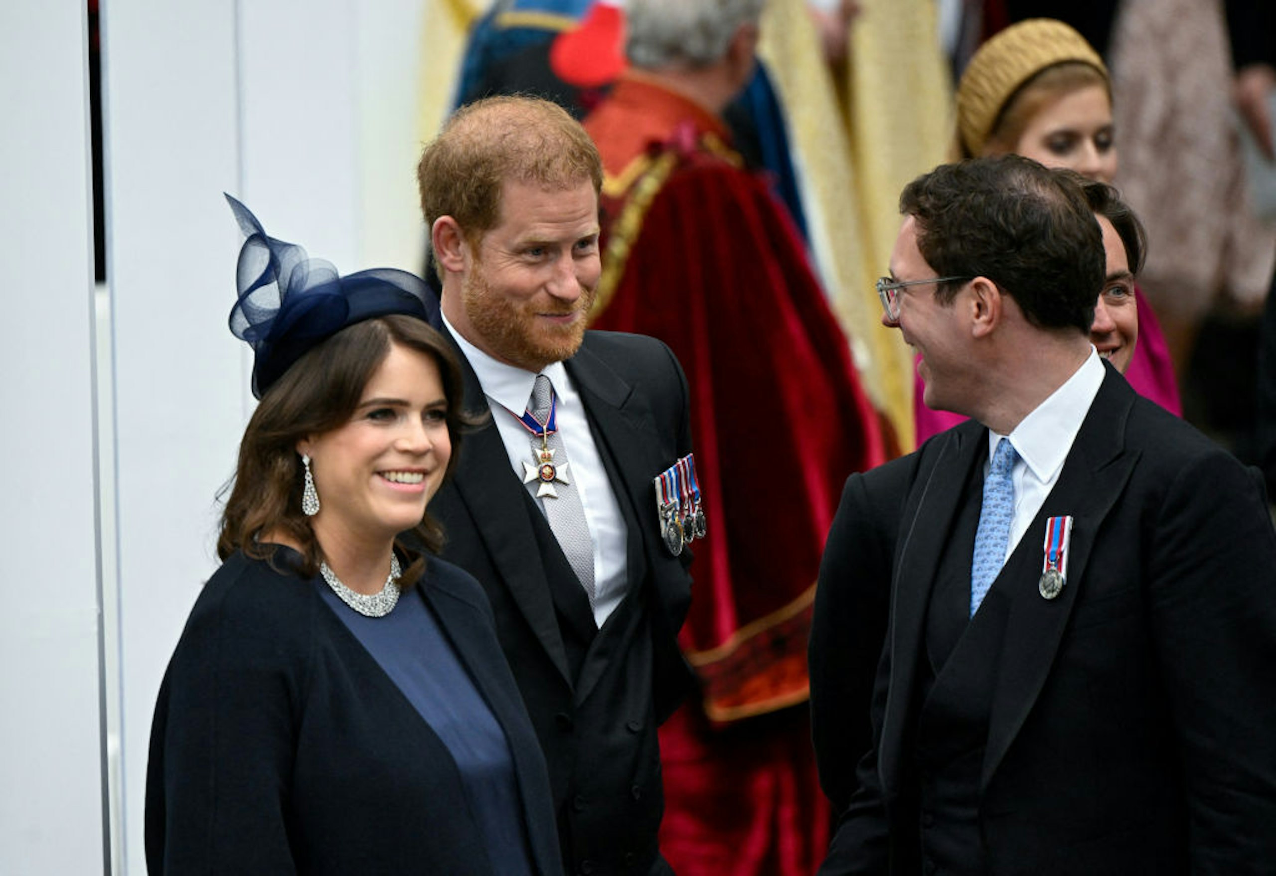 Prince Harry, Duke of Sussex, Princess Eugenie and her husband Jack Brooksbank leave Westminster Abbey following the Coronation of King Charles III and Queen Camilla on May 6, 2023
