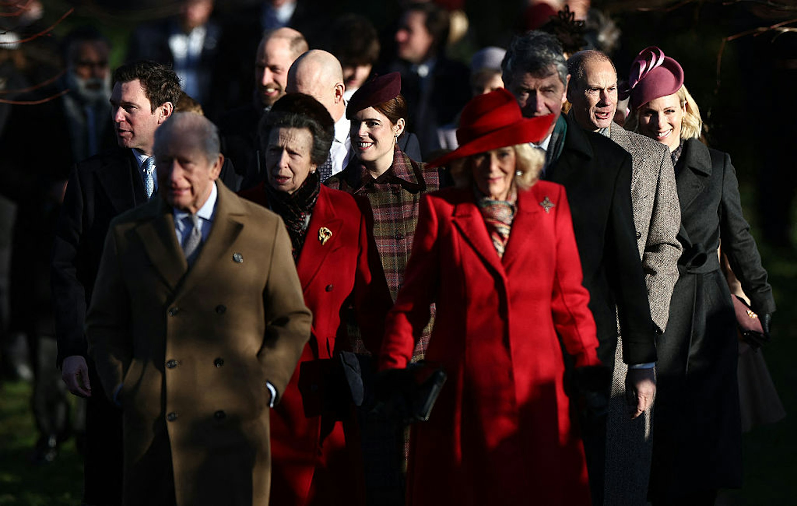 King Charles III and Queen Camilla lead Jack Brooksbank, Britain's Prince William, Prince of Wales, Britain's Princess Anne, Princess Royal, Britain's Princess Eugenie of York, Vice Admiral Timothy Laurence, Britain's Prince Edward, Duke of Edinburgh and Zara Tindall and others as they arrive for the Royal Family's traditional Christmas Day service at St Mary Magdalene Church on the Sandringham Estate in eastern England, on December 25, 2025