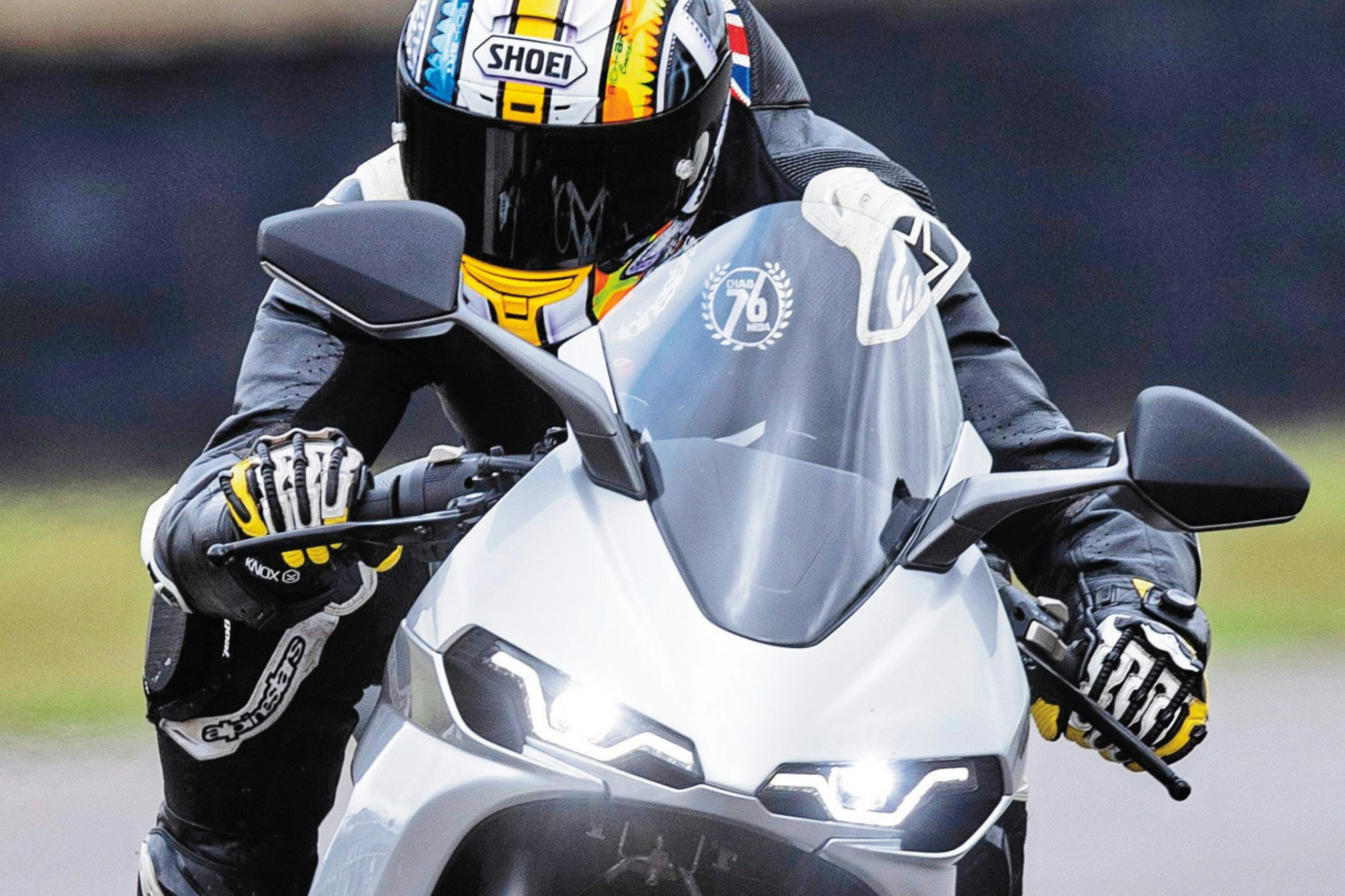 a rider on the Norton Manx R driving around a track