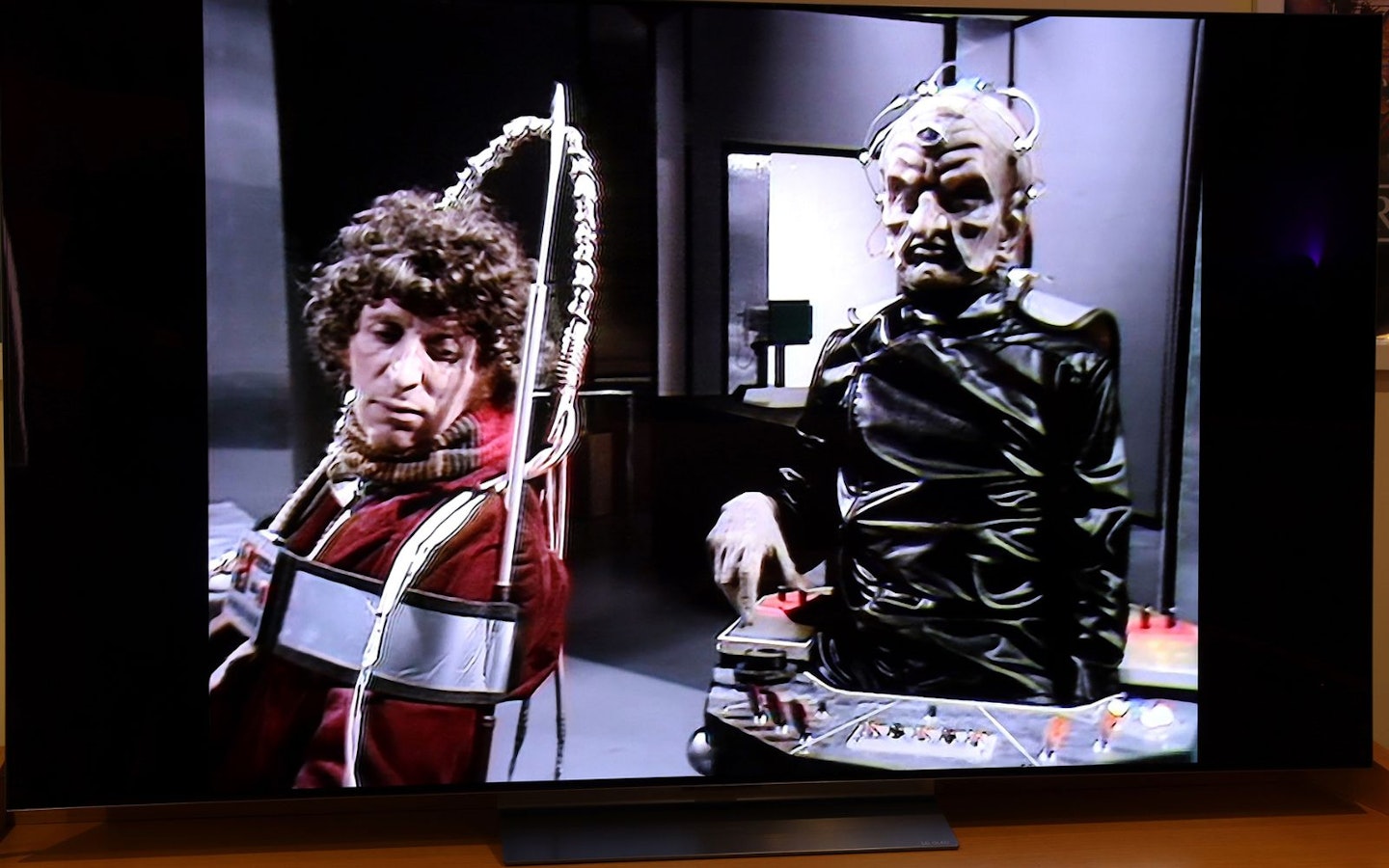LG C5 OLED evo AI 65-inch TV in a lounge showing Doctor Who and Davros