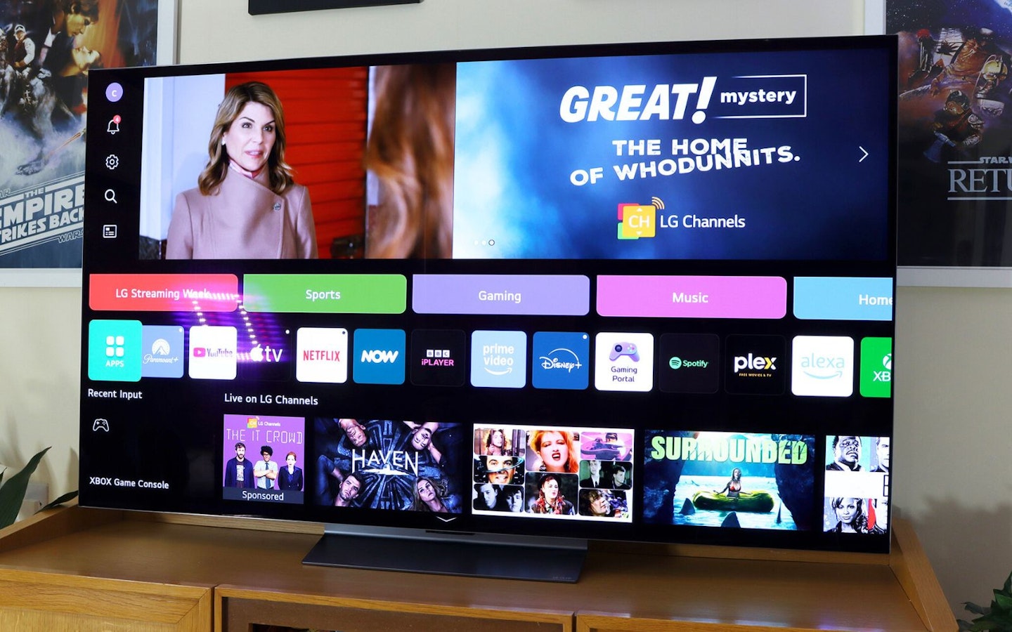 LG C5 OLED evo AI 65-inch TV in a lounge showing Home page