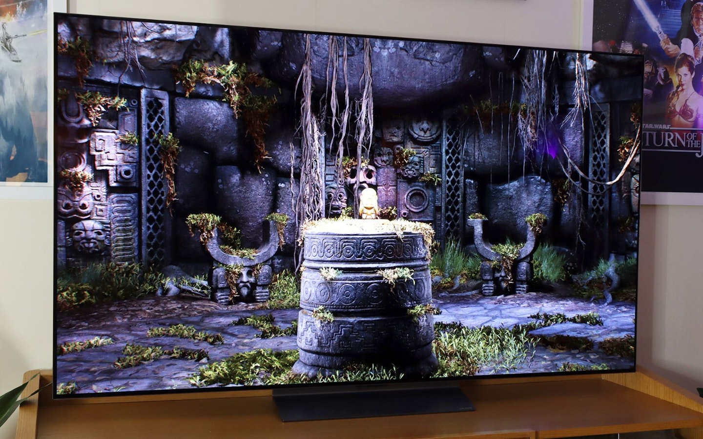 LG C5 OLED evo AI 65-inch TV with scene from Indiana Jones And The Great Circle