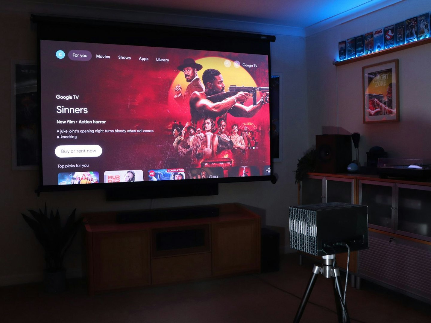 Valerion VisionMaster Pro 2 4K Laser Projector in a lounge with google tv
