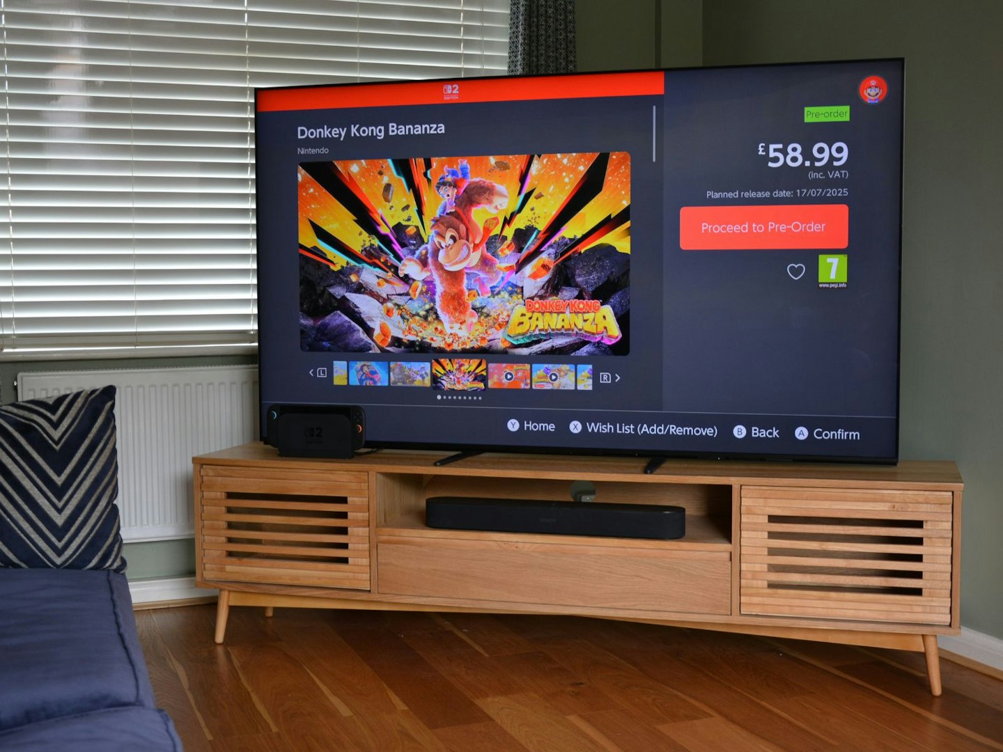 Nintendo Switch 2 docked, connected via HDMI to Sony BRAVIA 9 75-inch 4K 120Hz TV showing Nintendo eShop preorder highlight for Donkey Kong Bonanza, available for £58 digital download