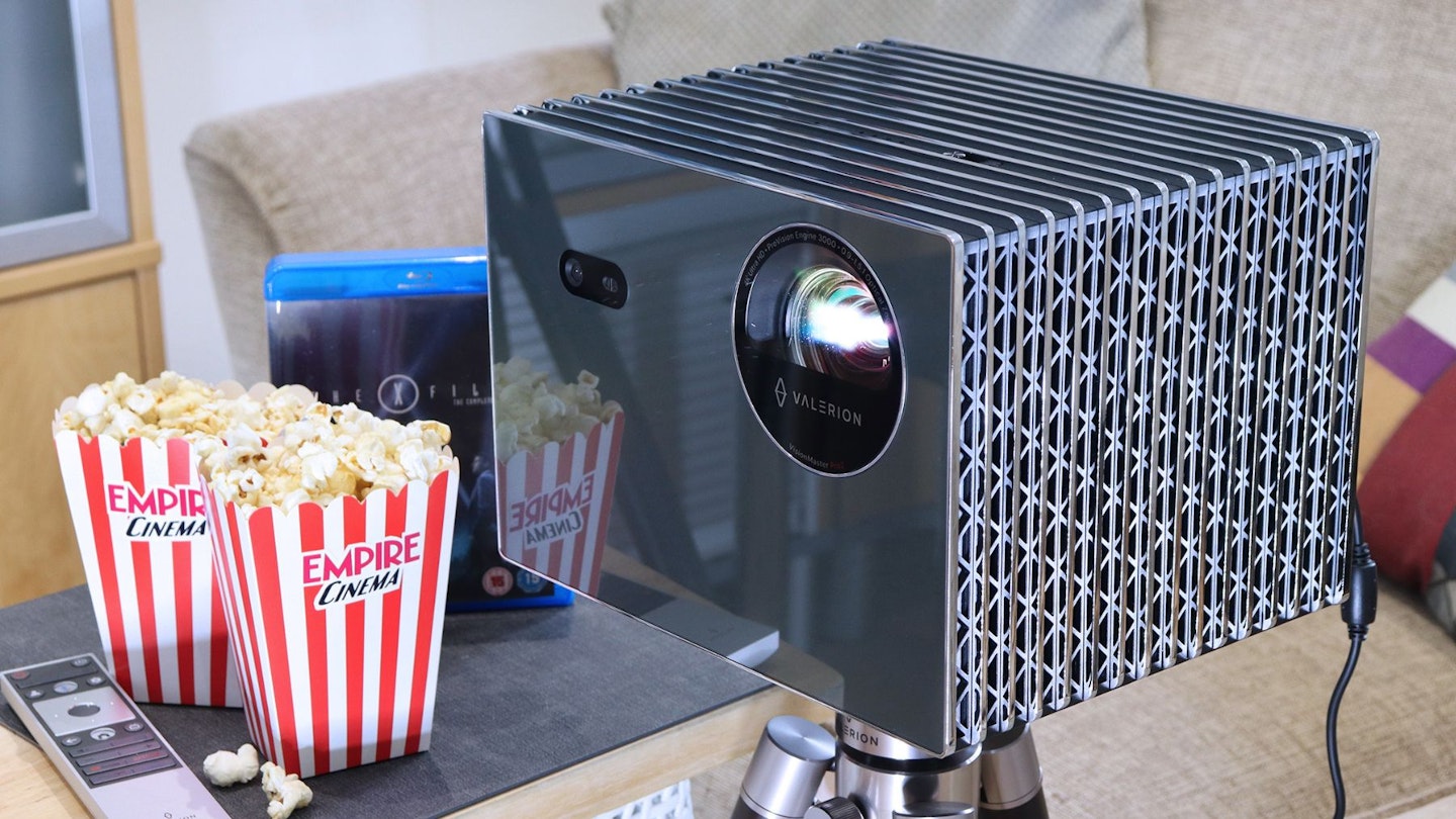 Valerion VisionMaster Pro 2 4K projector in a lounge with Empire popcorn