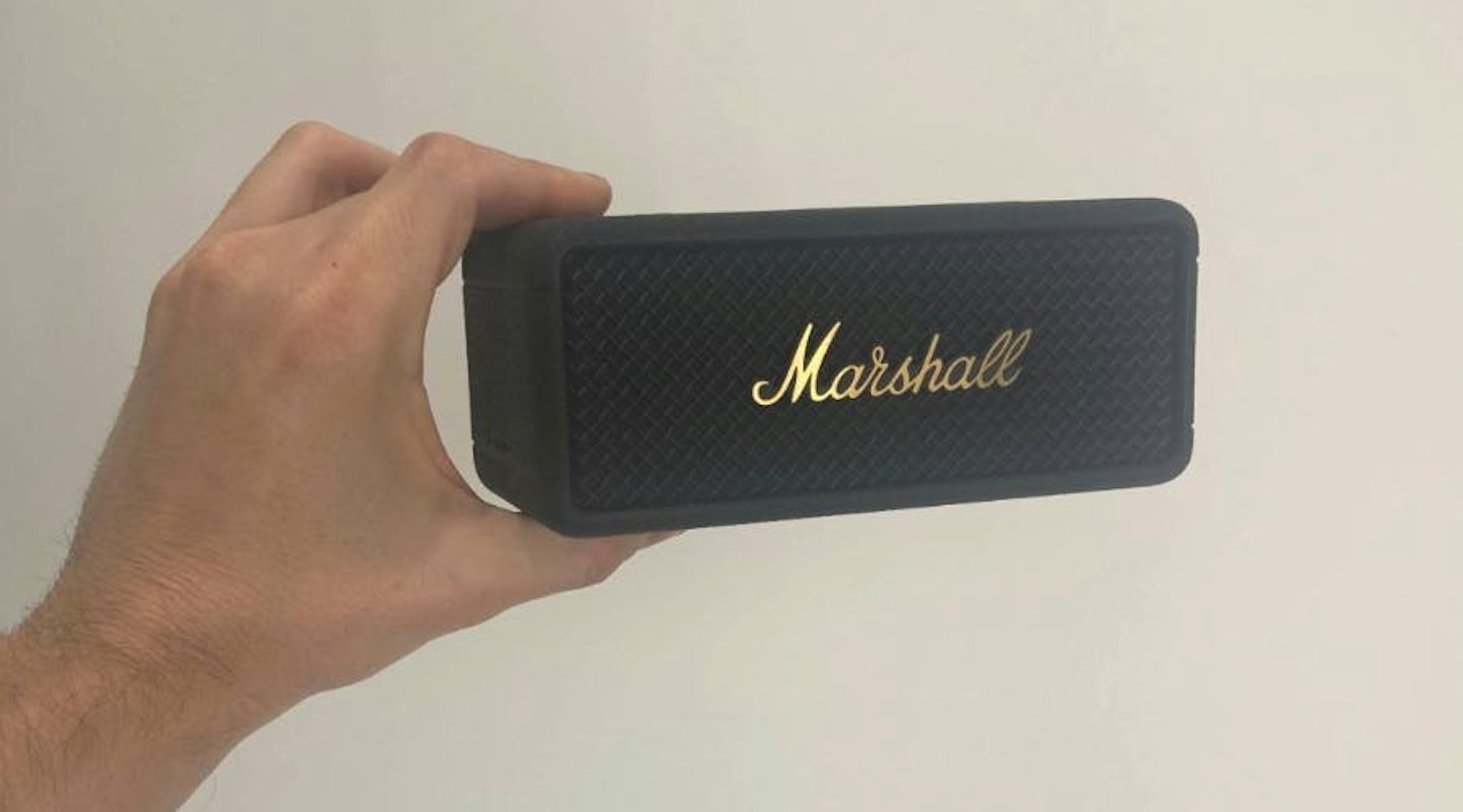 Marshall Emberton III speaker being held. Christmas tech gift guide.