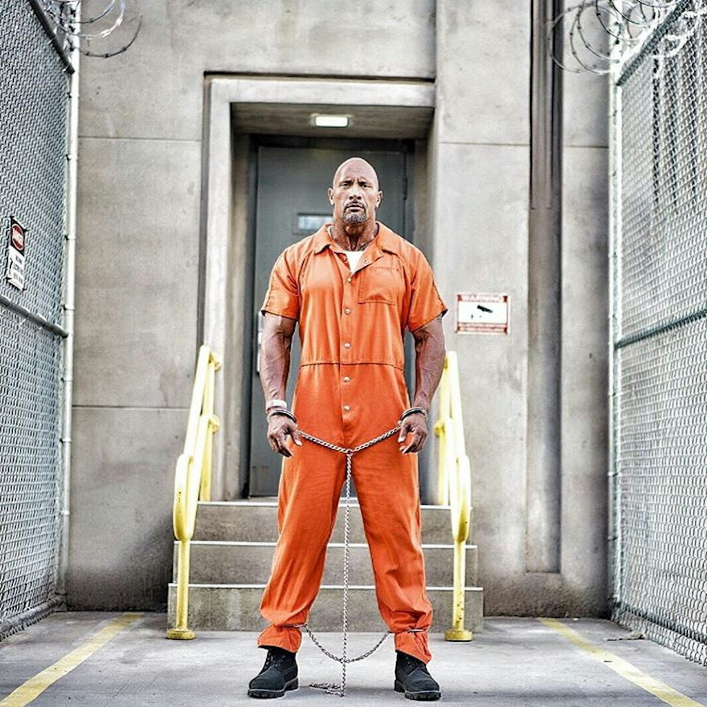 Dwayne Johnson as Luke Hobbs in Fast 8 – prison gear