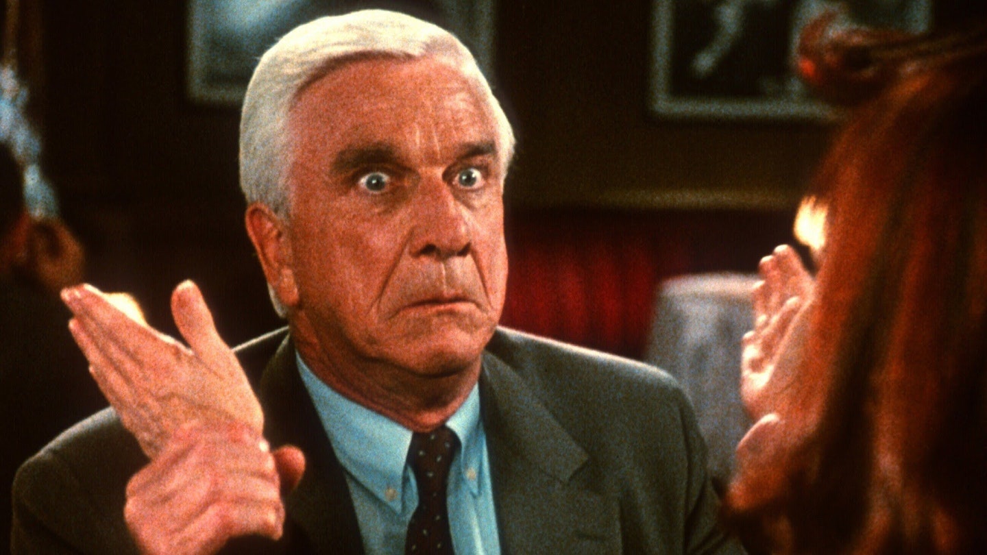 Leslie Nielsen as Frank Drebin in The Naked Gun