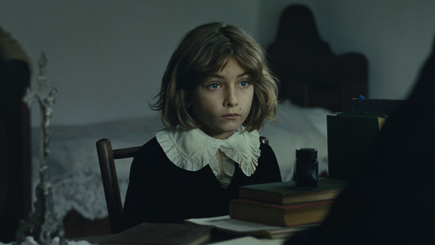 The Boy in Childhood Of A Leader