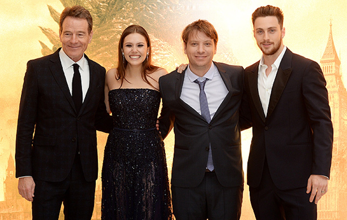 Bryan Cranston, Elizabeth Olsen and Aaron Taylor Johnson attend the European premiere of Godzilla at the Odeon Leicester Square