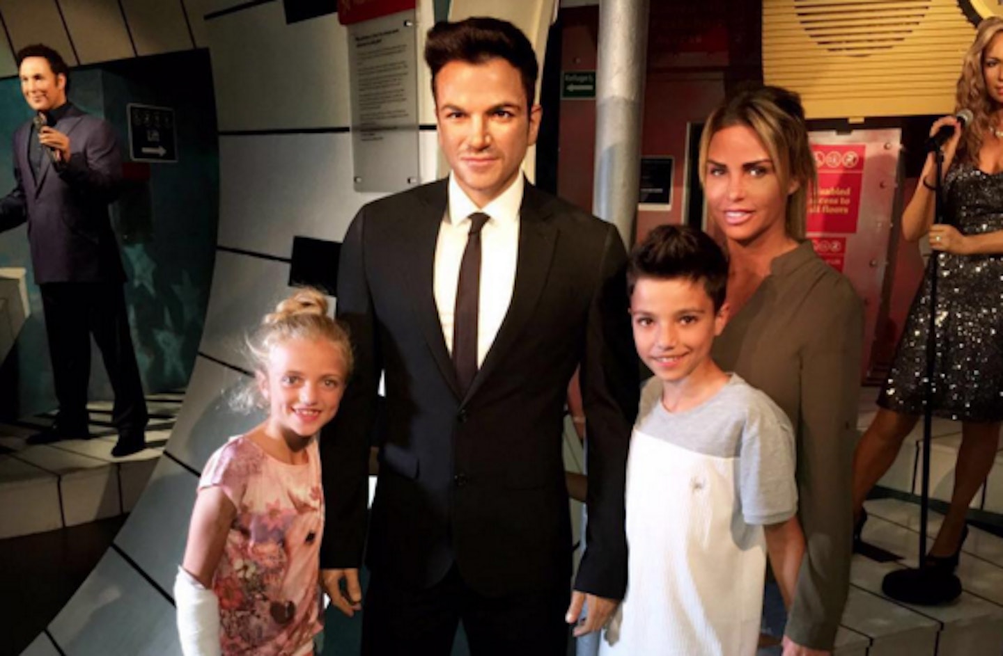 Katie Price with Princess and Junior and Peter Andre waxwork
