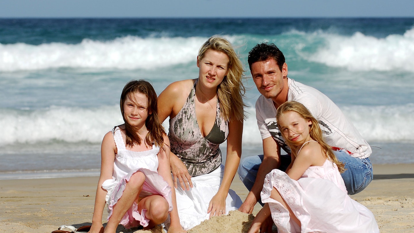 Dean Gaffney with Sarah Burge and daughters Charlotte and Chloe on the beach