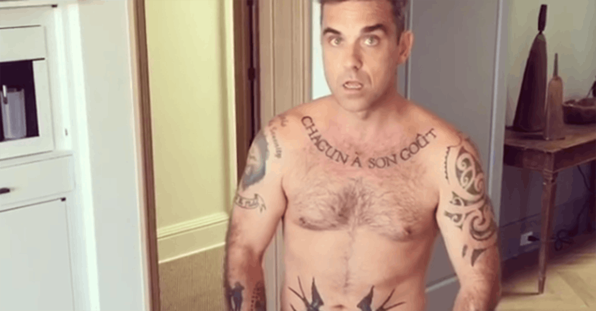 Robbie Williams and Louis Tomlinson give each other matching tattoos |  Metro News