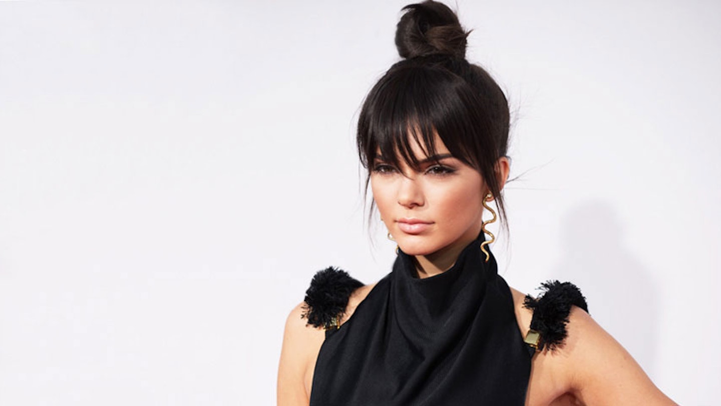 Kendall Jenner red carpet top knot hairstyle