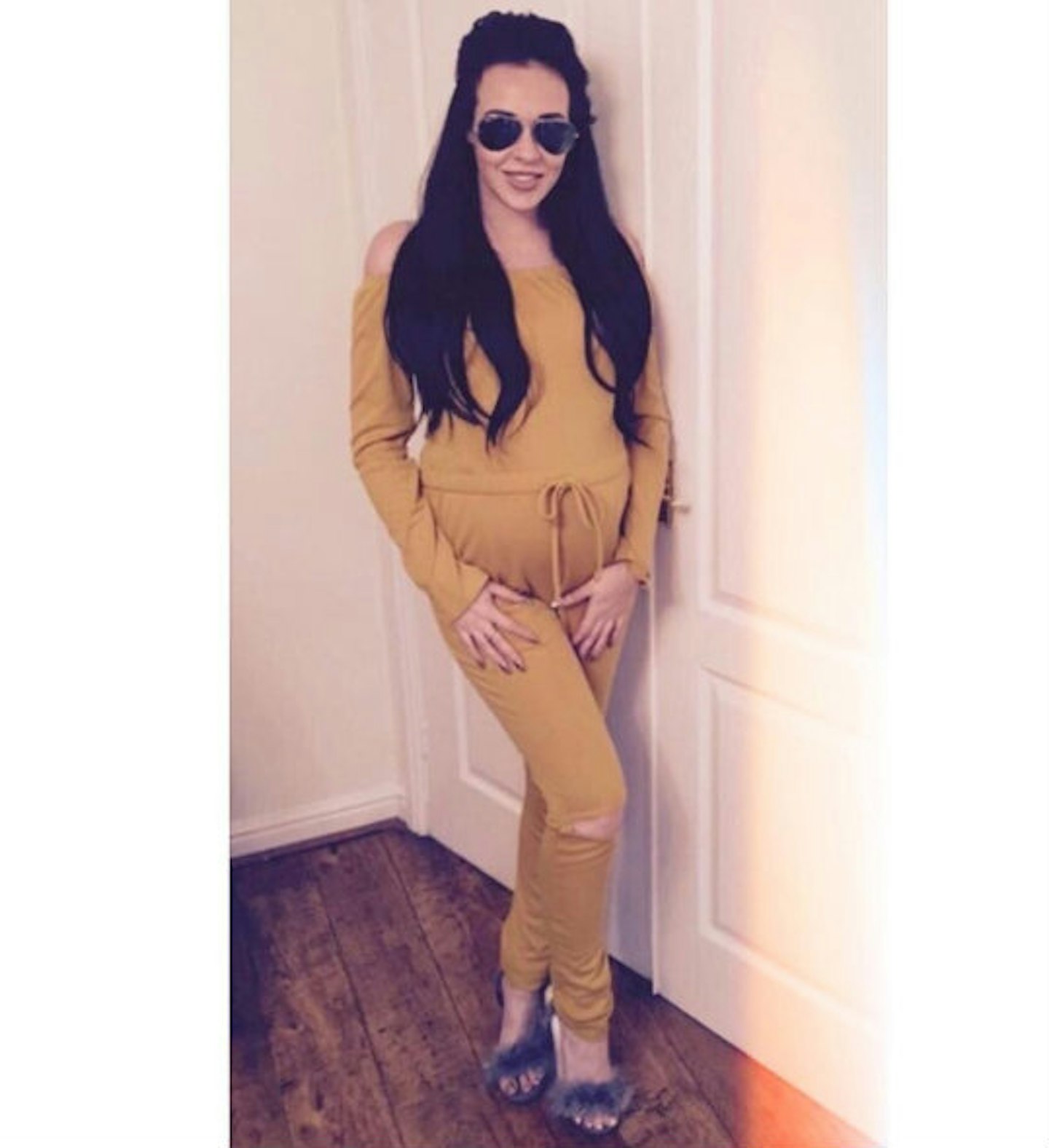 Stephanie Davis with long hair and bump