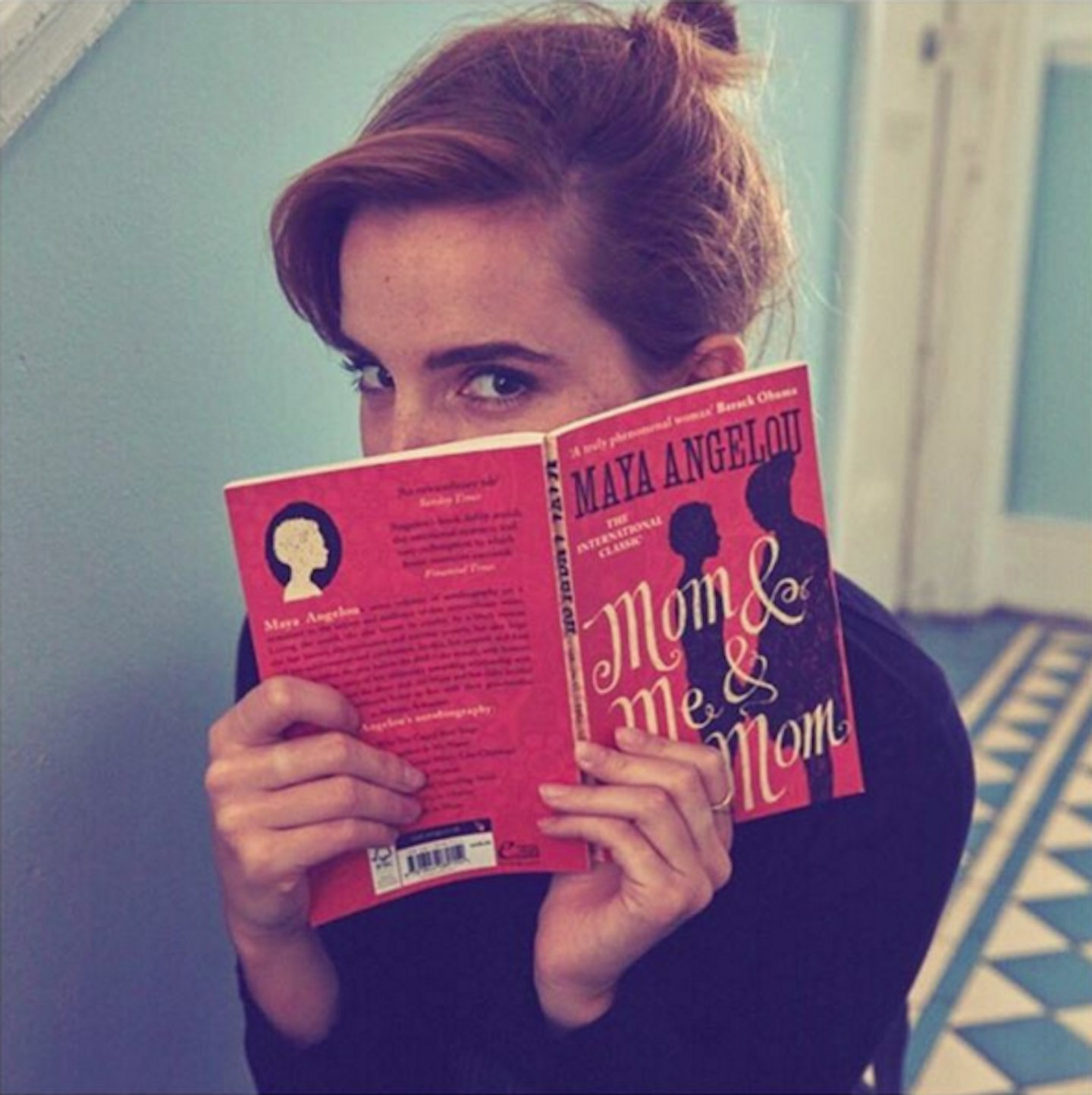 emma watson hiding books london underground