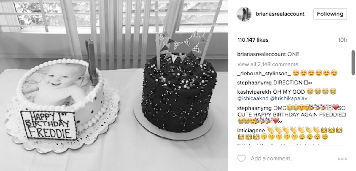 Louis Tomlinson helps his son Freddie blow out his candles in adorable snap