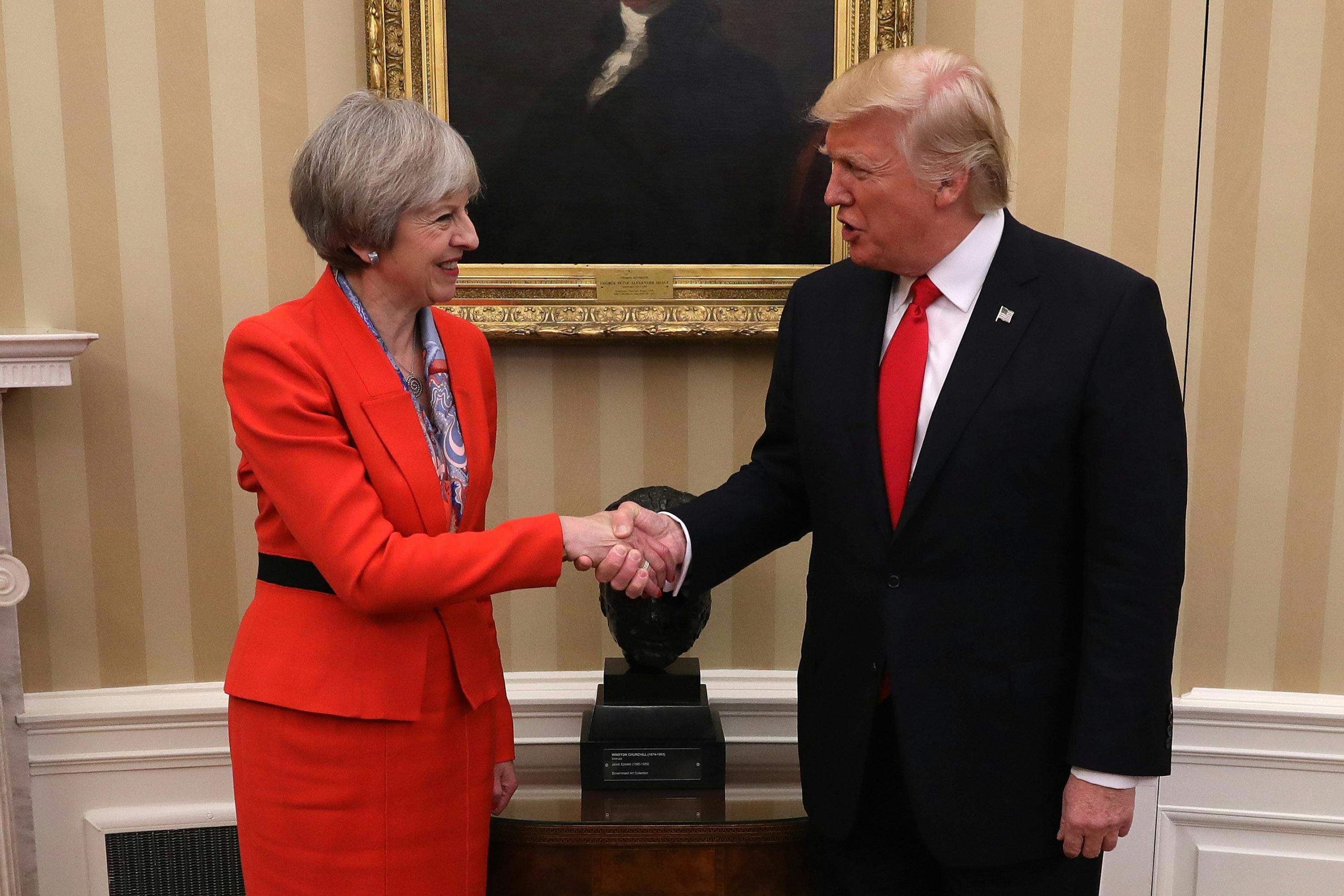 theresa-may-finally-reveals-why-she-held-hands-with-donald-trump-grazia