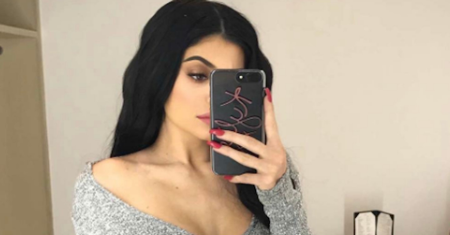 Kylie Jenner taking a mirror selfie