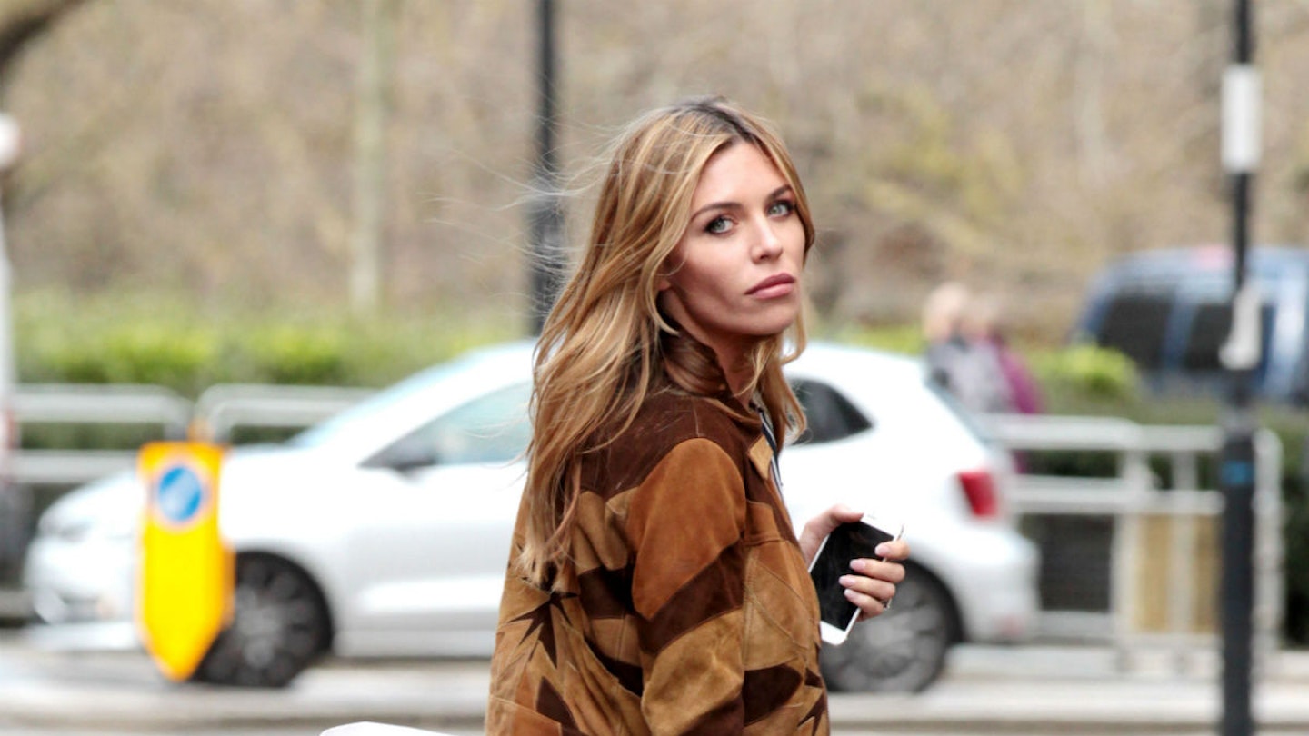 Abbey Clancy takes care of her luscious locks