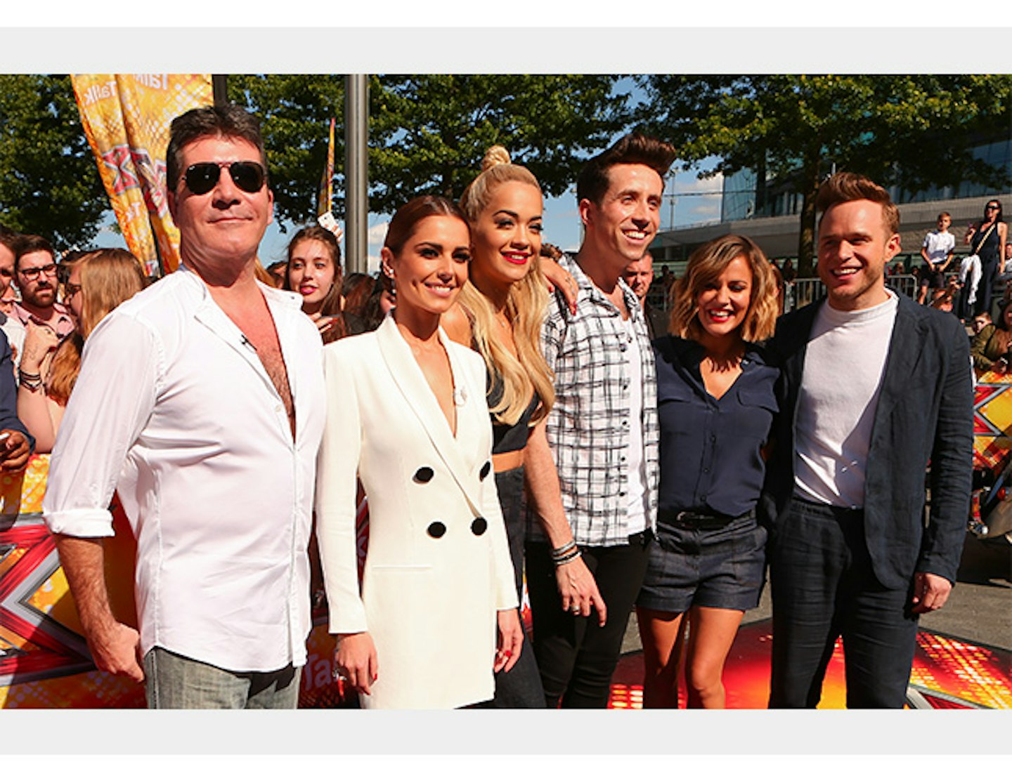 Cheryl with Simon, new judges Rita Ora and Nick Grimshaw, and new presenters Caroline Flack and Olly Murs