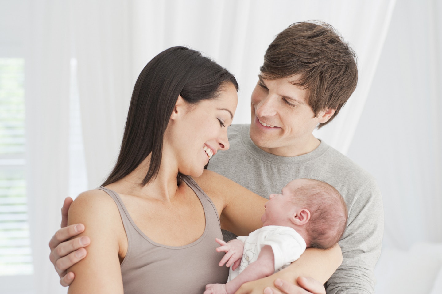 Parents with newborn baby