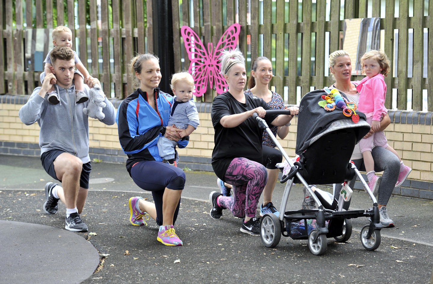 Parents working out with kids