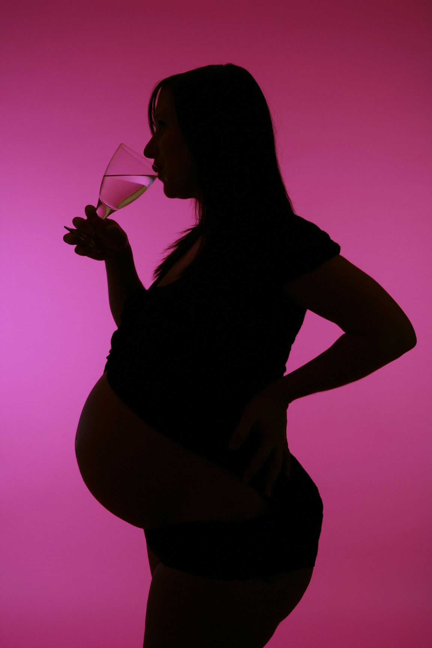 Pregnant woman drinking alcohol