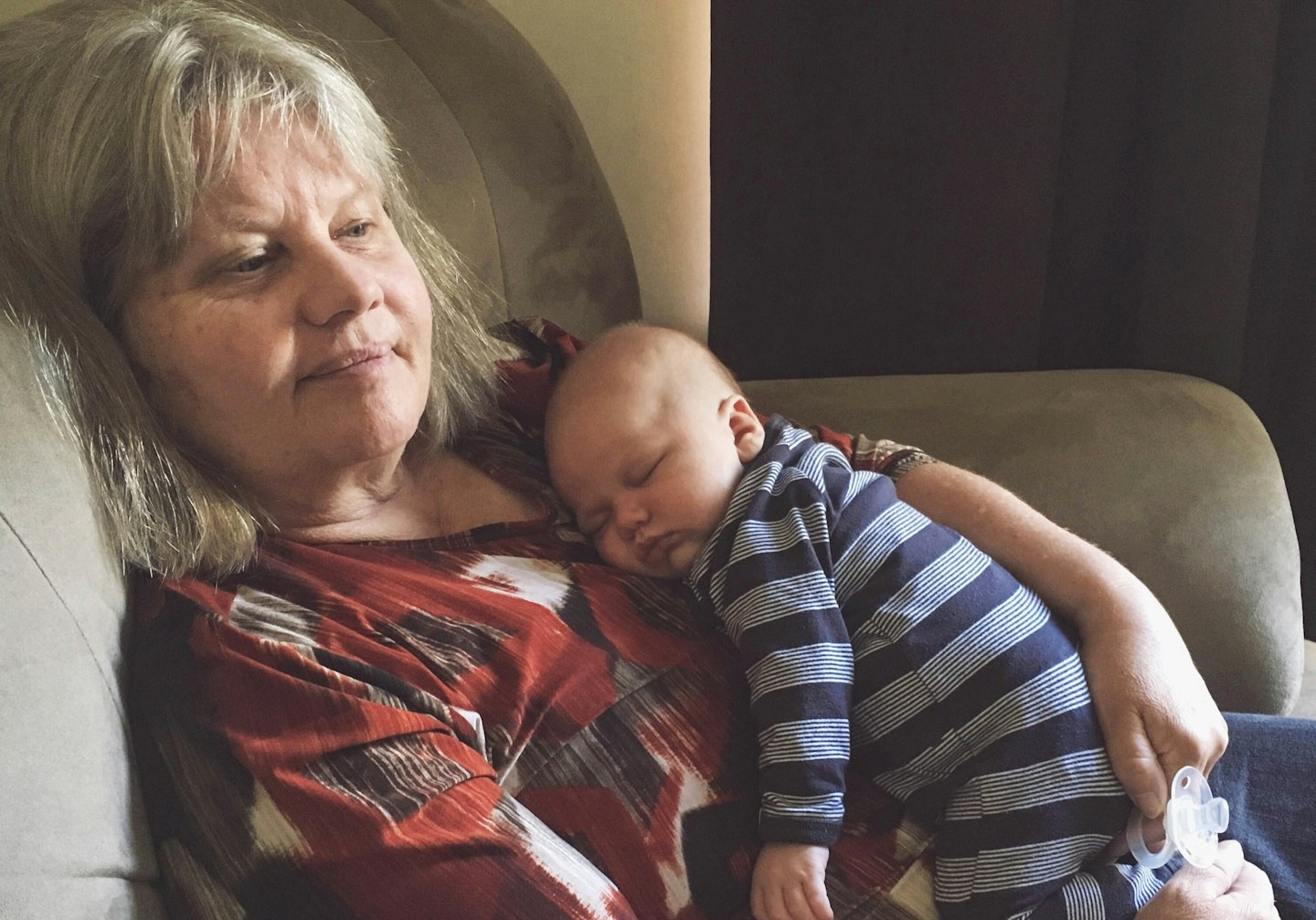 Baby cuddle grandma