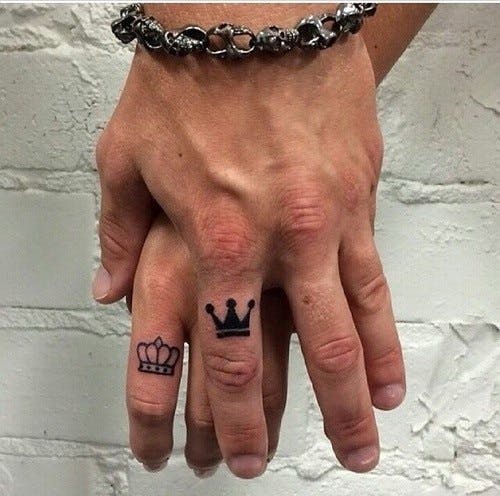 Minimalist couples matching ring tattoo