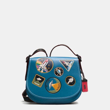This Luxury Fashion Brand Made Some Space-Themed Bags and Clothes and The  Results are Super Cute | Grazia