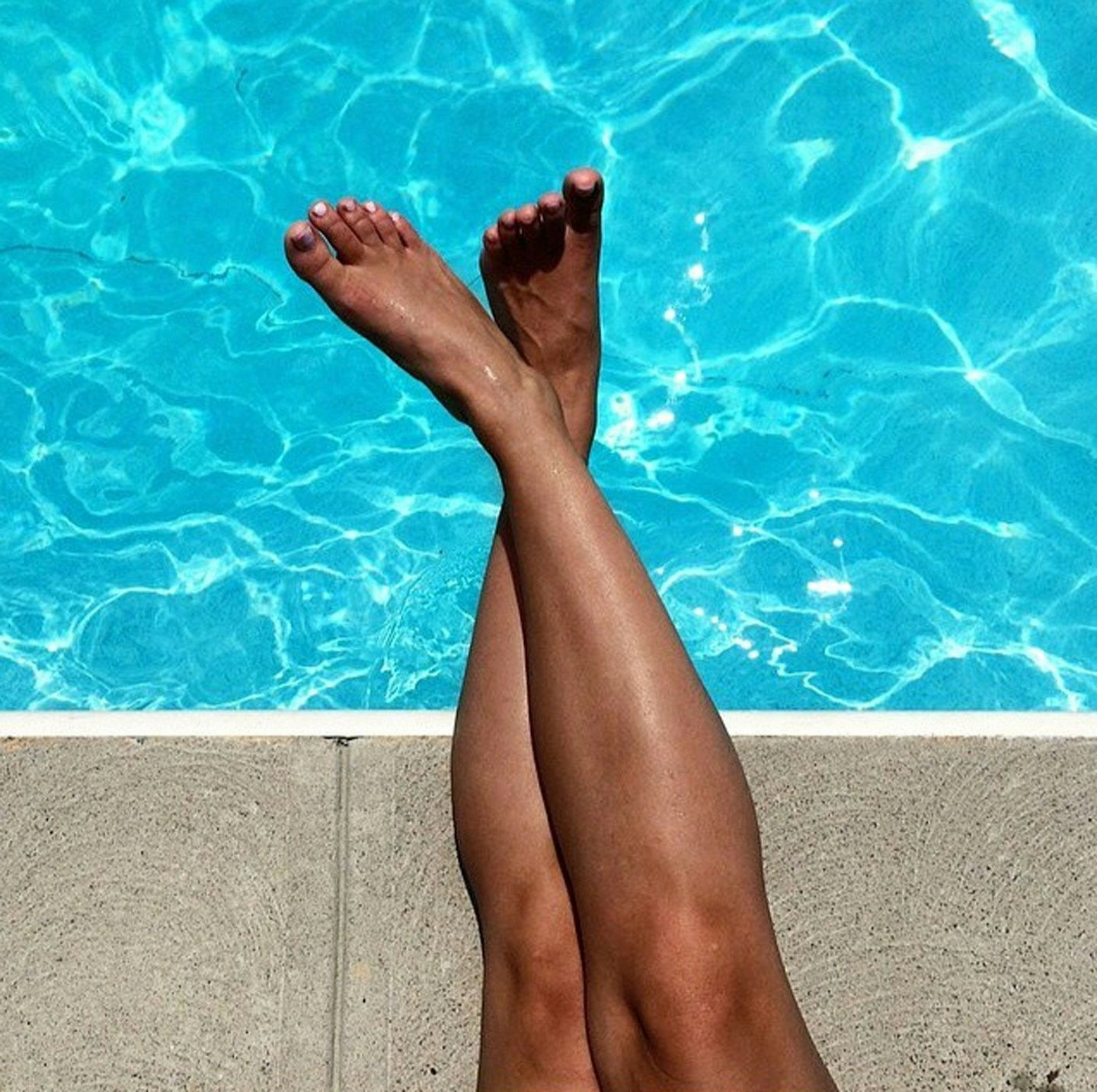 Legs by the pool
