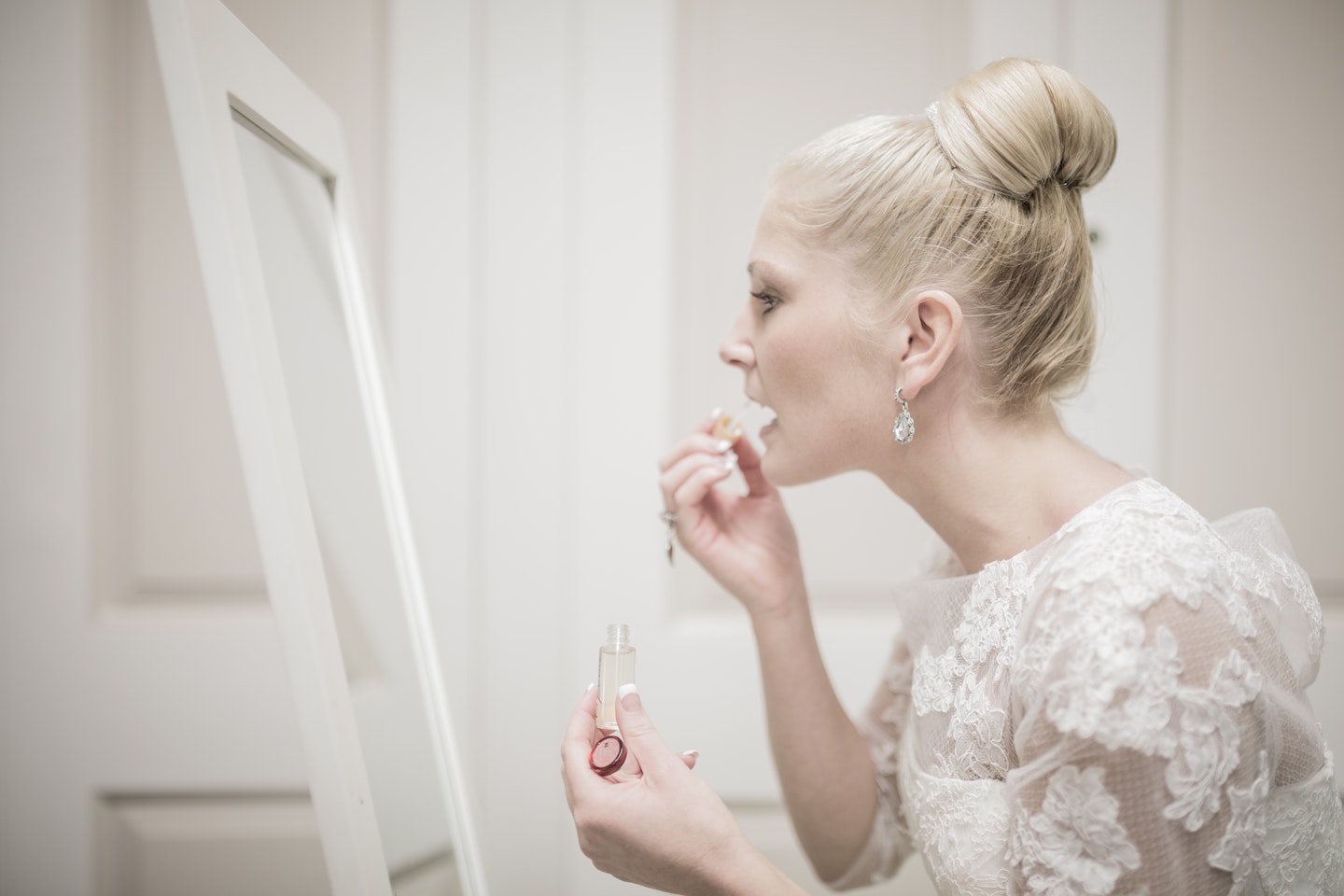 wedding day makeup bridal beauty woman in mirror