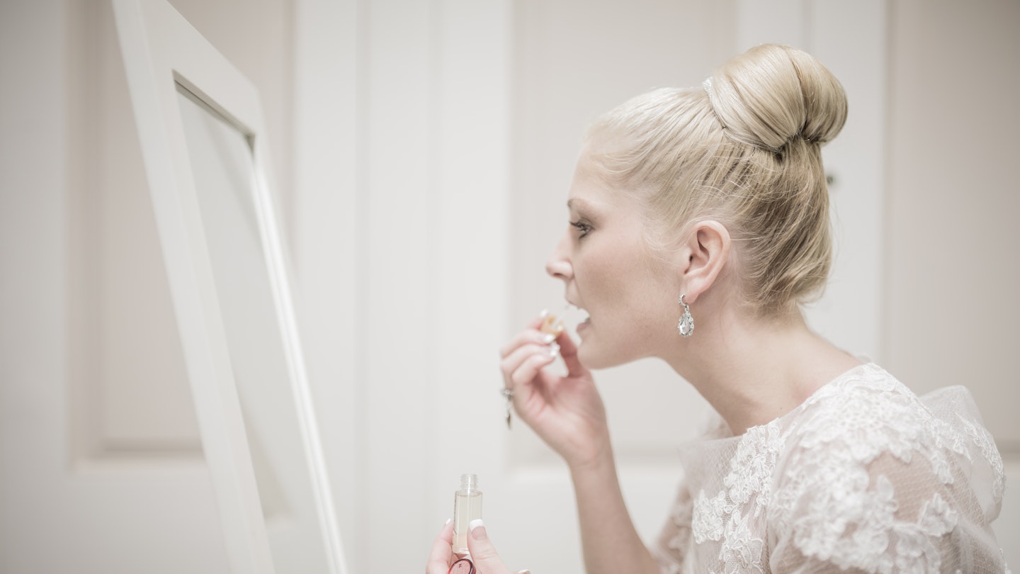 wedding day makeup bridal beauty woman in mirror