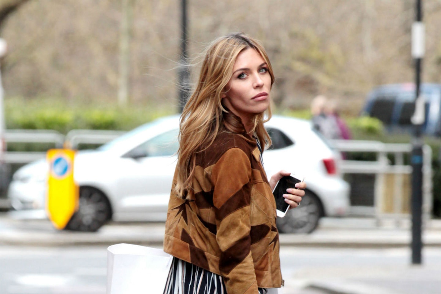 Abbey Clancy takes care of her luscious locks