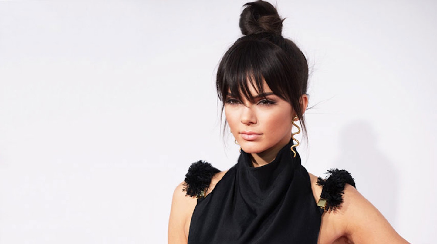 Kendall Jenner red carpet top knot hairstyle