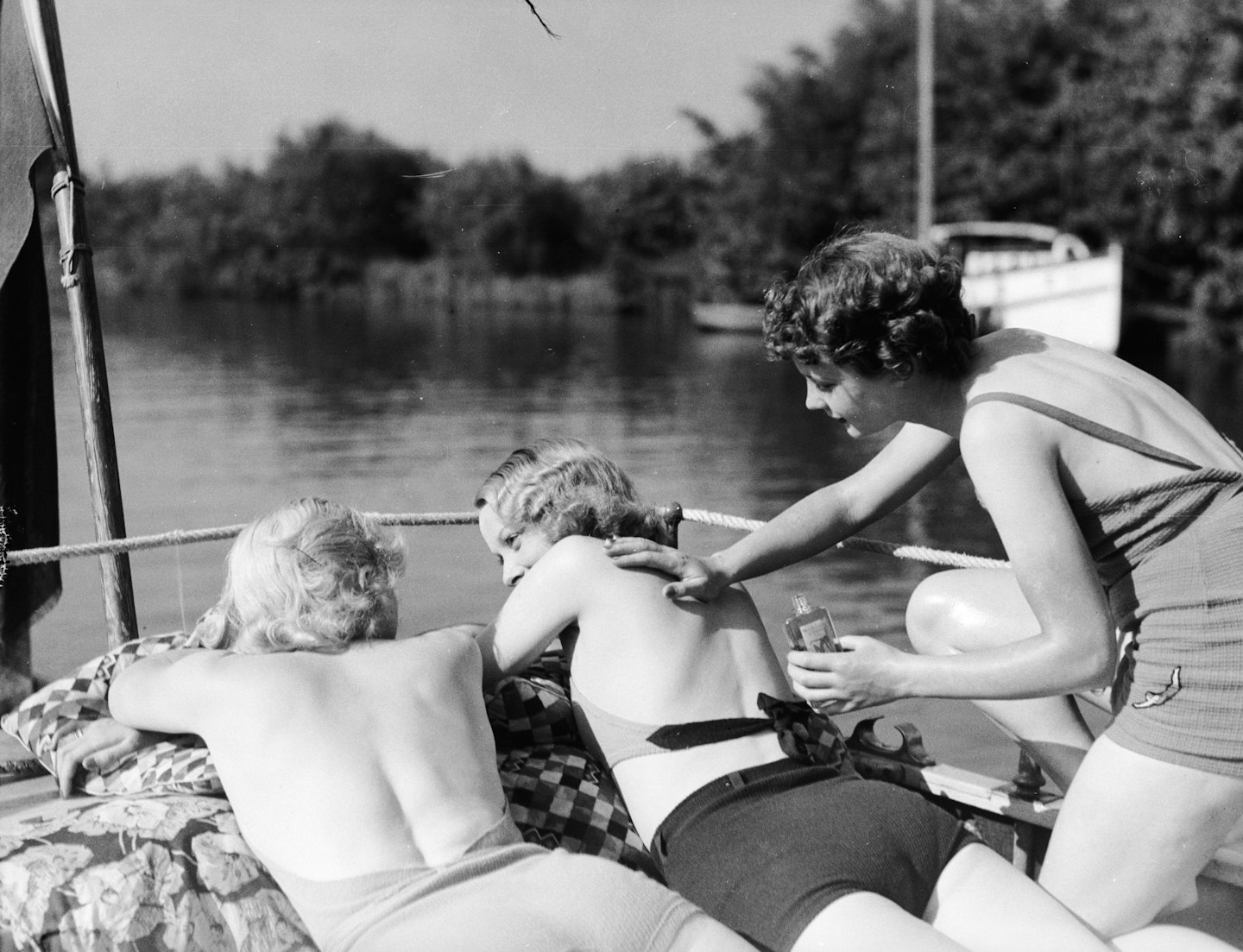 Women applying sunscreen