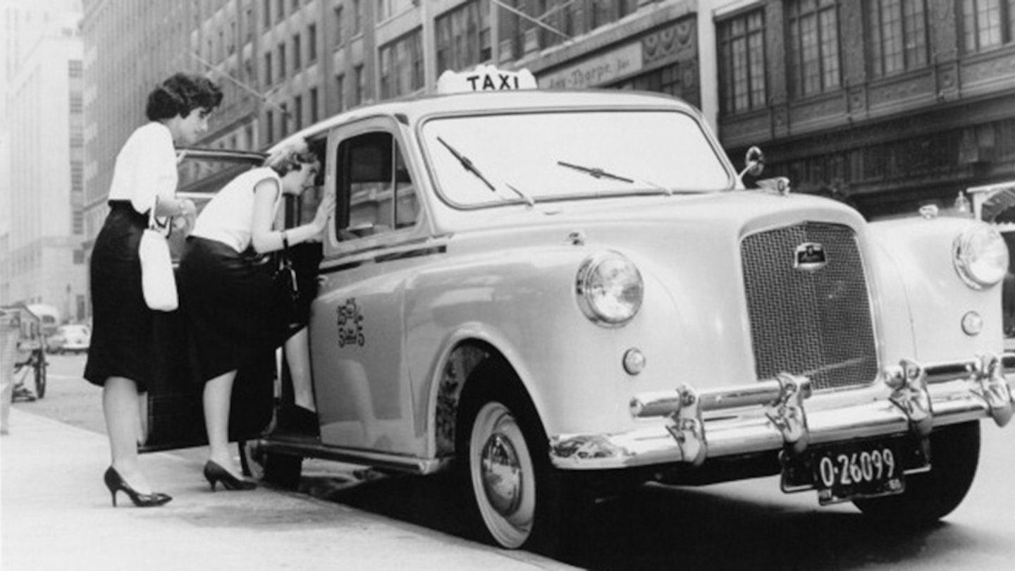 Vintage taxi cab, black and white, 1960s, photot, chariots for women app