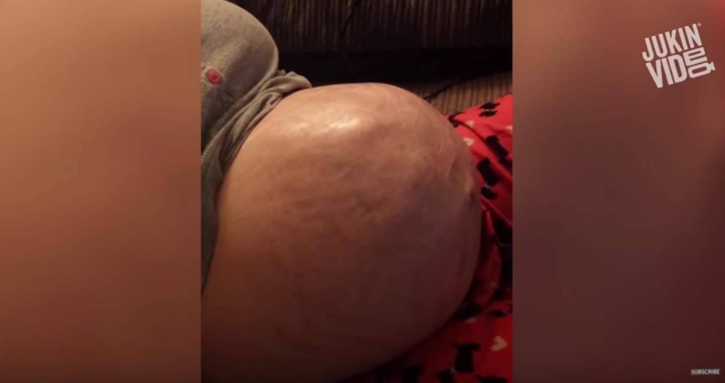Jukin Video Youtube woman pregnancy baby rolling