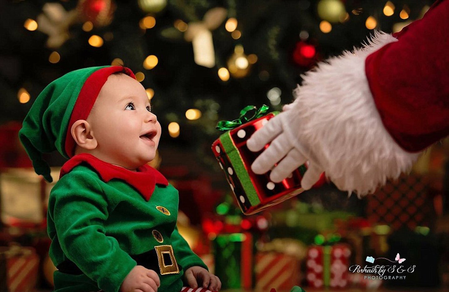 baby meets father christmas for the first time