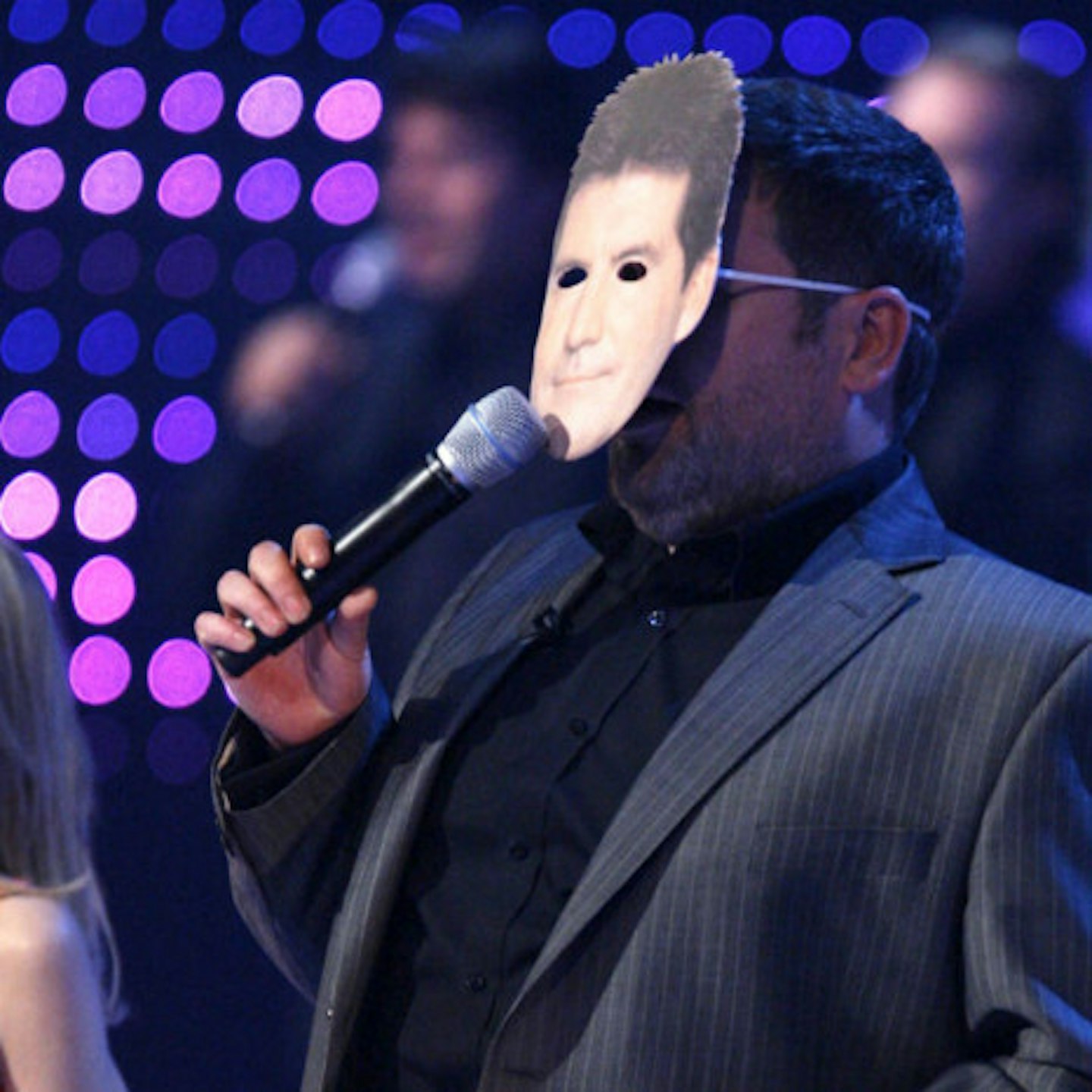 Yes, this is Chris Moyles in a Simon Cowell mask