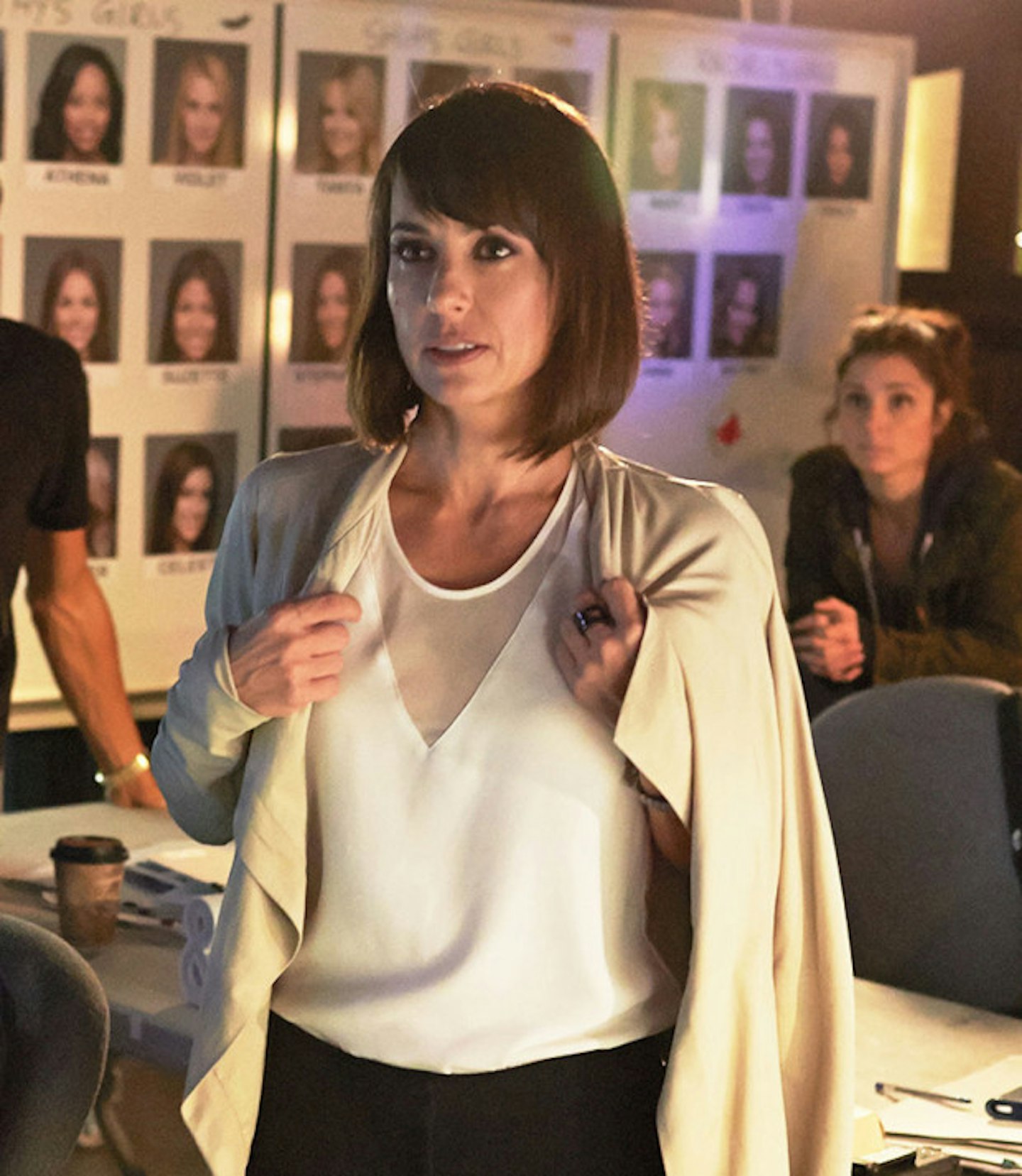 Quinn, played by Constance Zimmer
