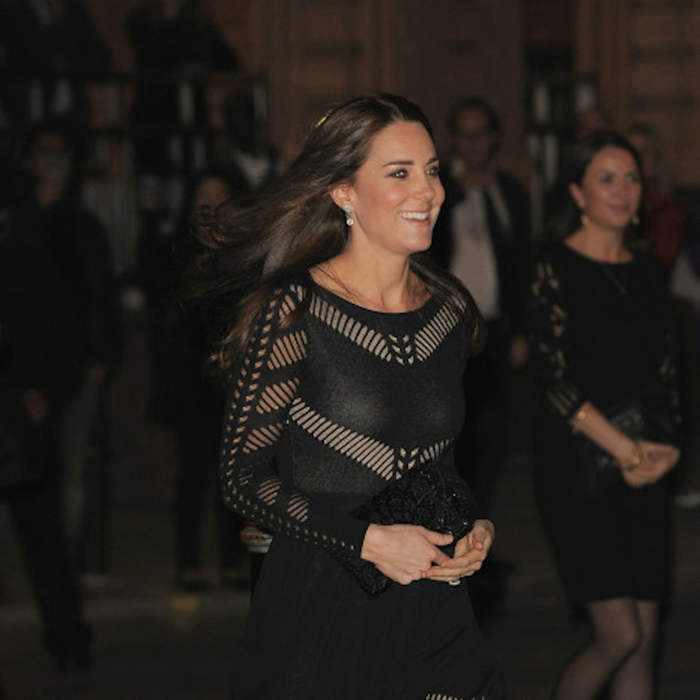 Kate showed off her tiny baby bump on Thursday night