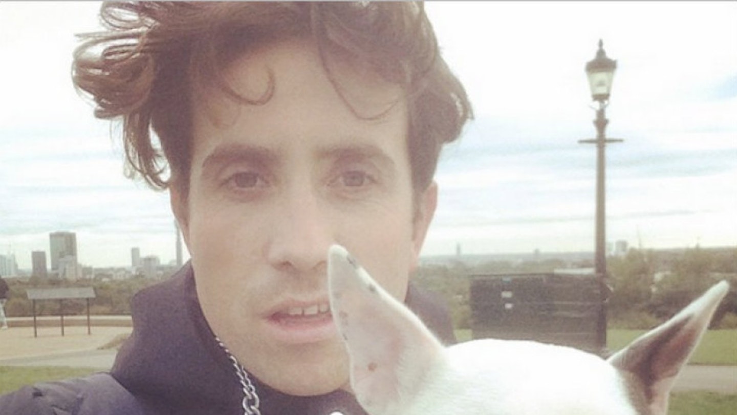 Nick Grimshaw with his dog, Pig