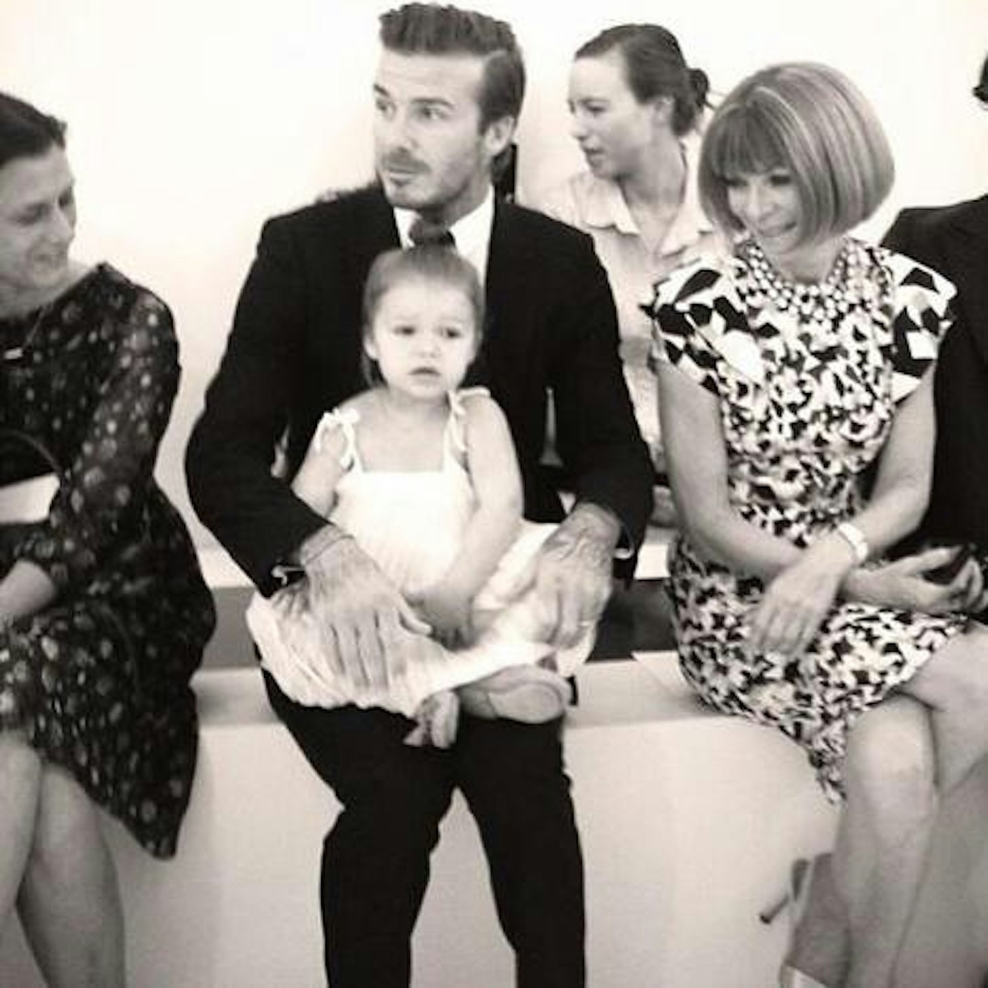 Victoria tweeted this cute snap with the caption: 'All eyes on Baby Harper at #SS14 Victoria Beckham'