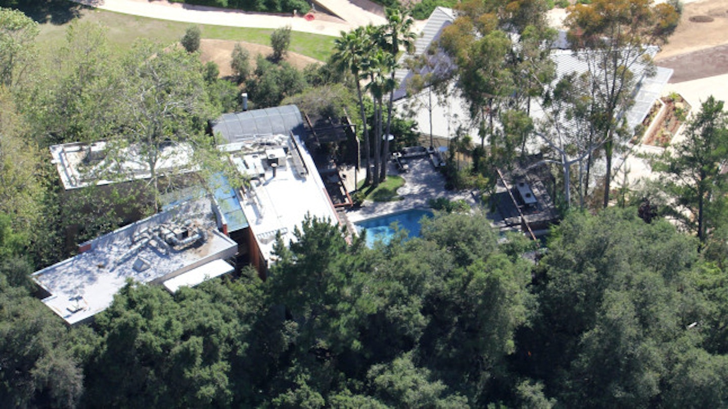 The mansion from the air, with the pool visible