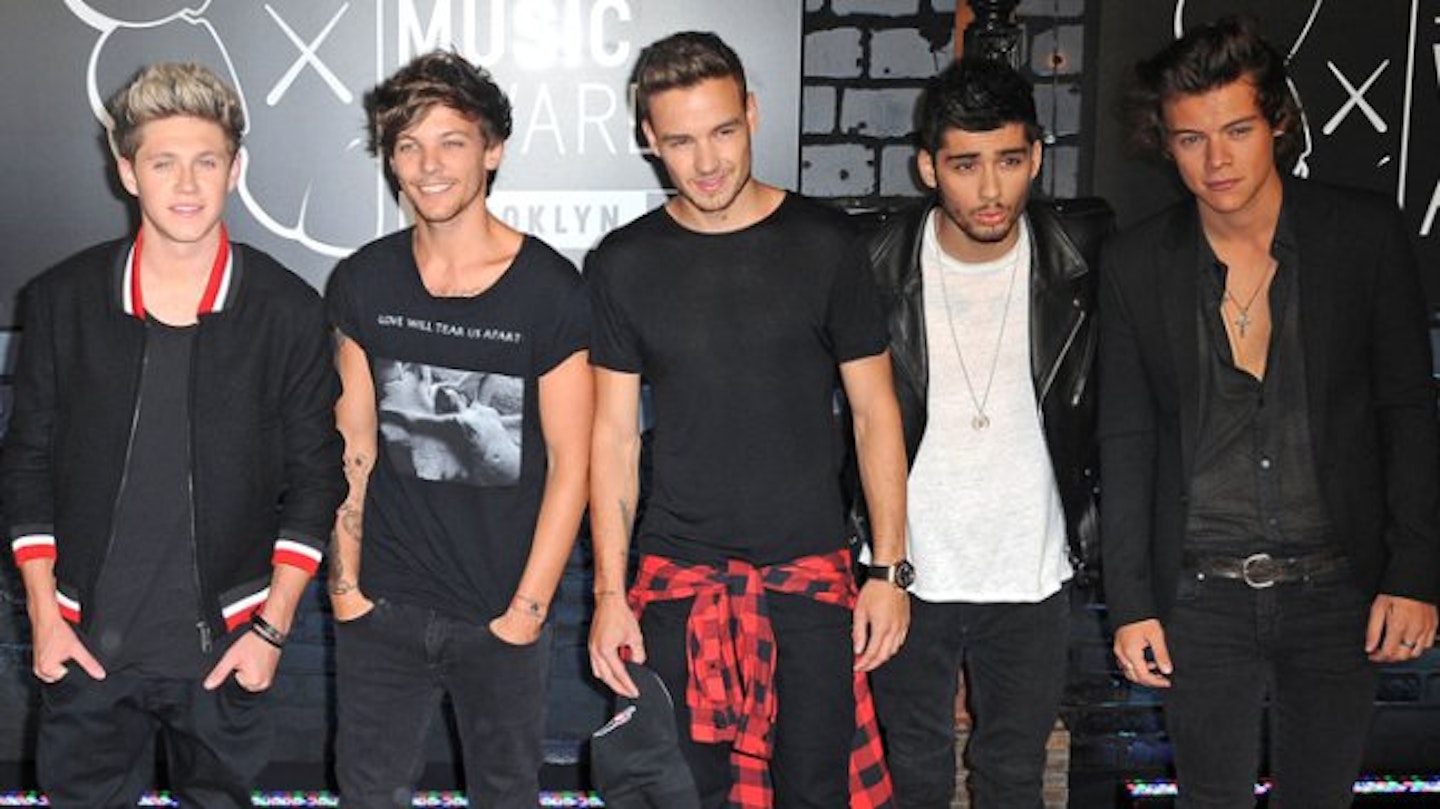 Harry with his One Direction bandmates