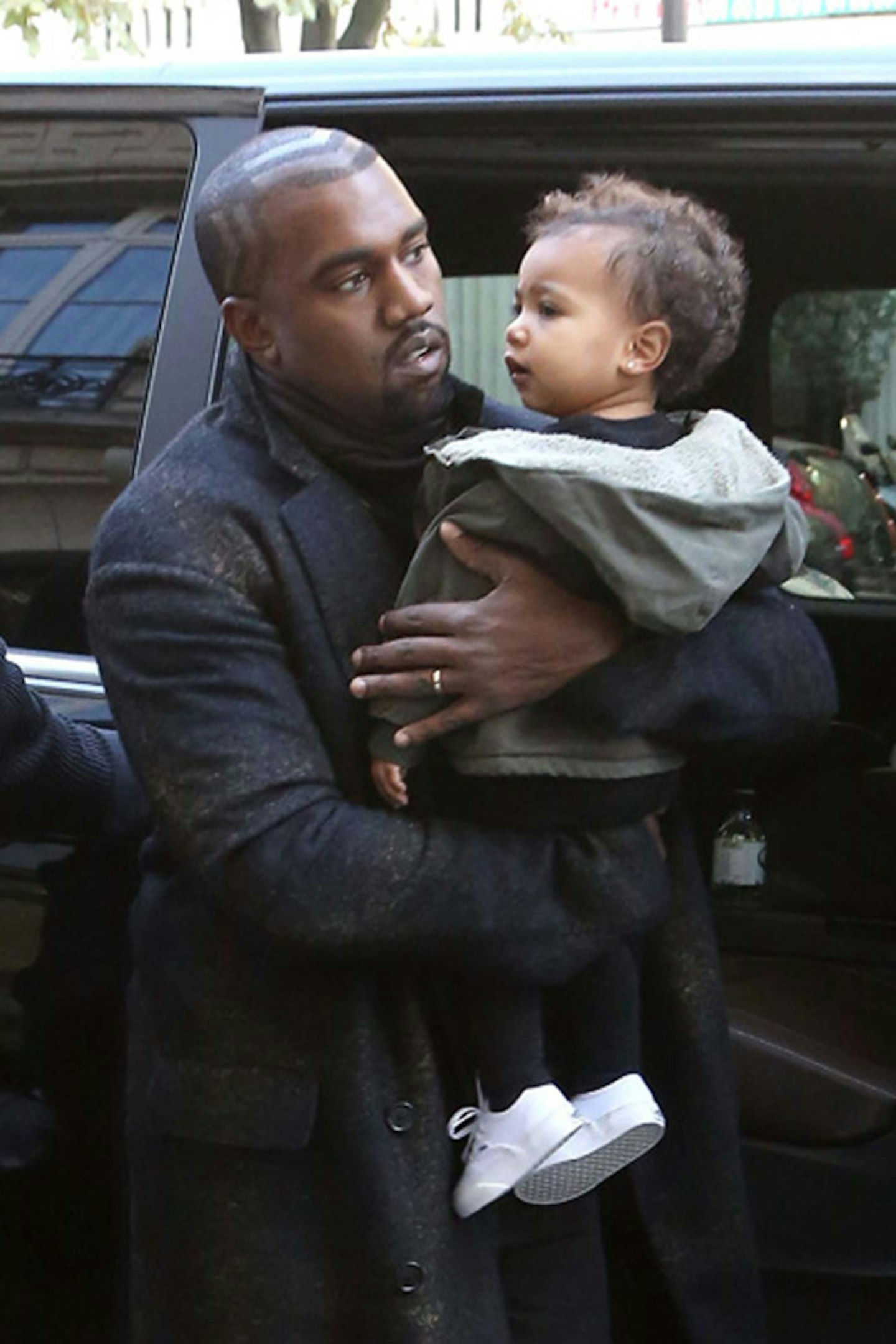 Kanye West and North West arrive in Paris